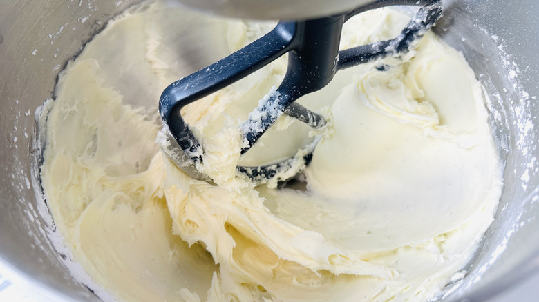 Vanilla frosting in mixing bowl