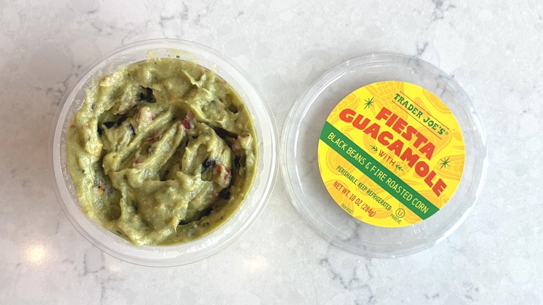 An open container of Trader Joe's Fiesta Guacamole