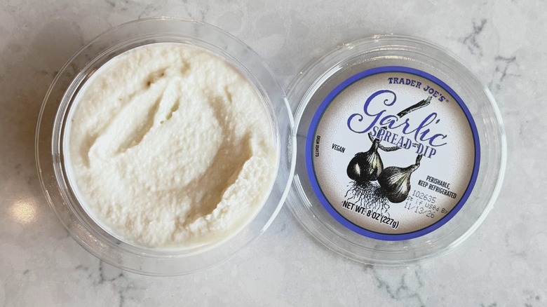 An open container of Trader Joe's Garlic Spread Dip