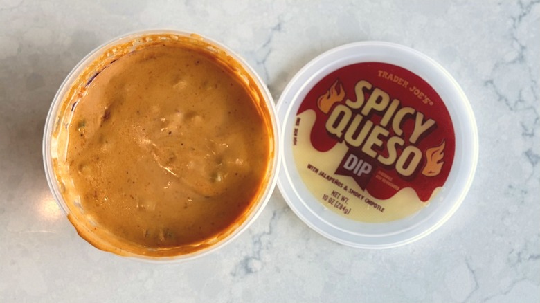 An open container of Trader Joe's Spicy Queso Dip