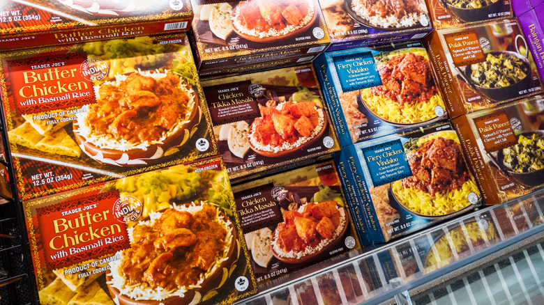 Assorted Trader Joe's frozen Indian meals in the freezer section