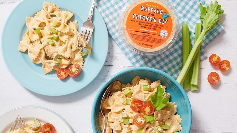 Trader Joe's Buffalo Chicken Dip next to several prepared plates