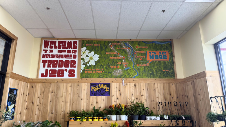 A welcome sign and map inside a Trader Joe's grocery store