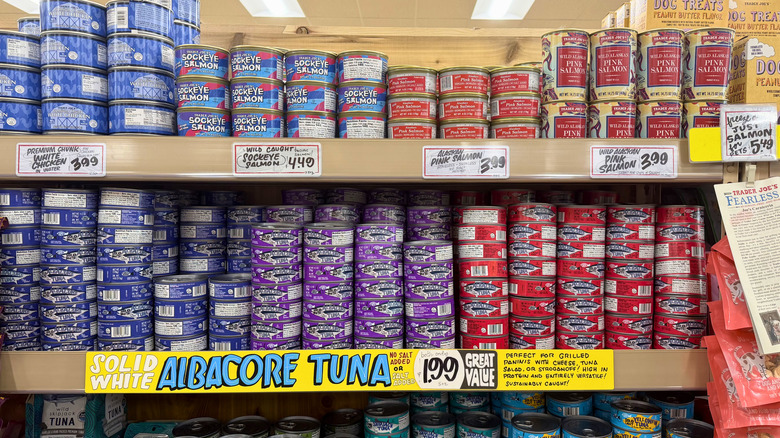 Canned seafood on shelves at Trader Joe's.