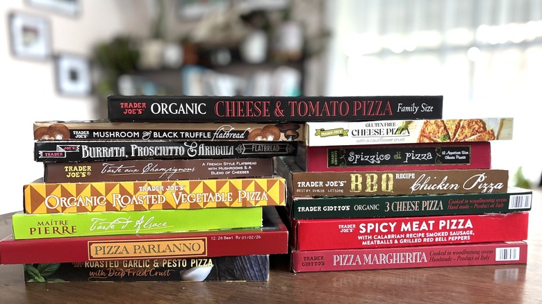 Trader Joe's pizza styles stacked on table