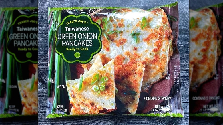 A bag of Trader Joe's Taiwanese Green Onion Pancakes on a wooden surface