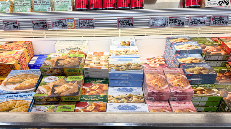 a freezer aisle at Trader Joe's featuring various pastries