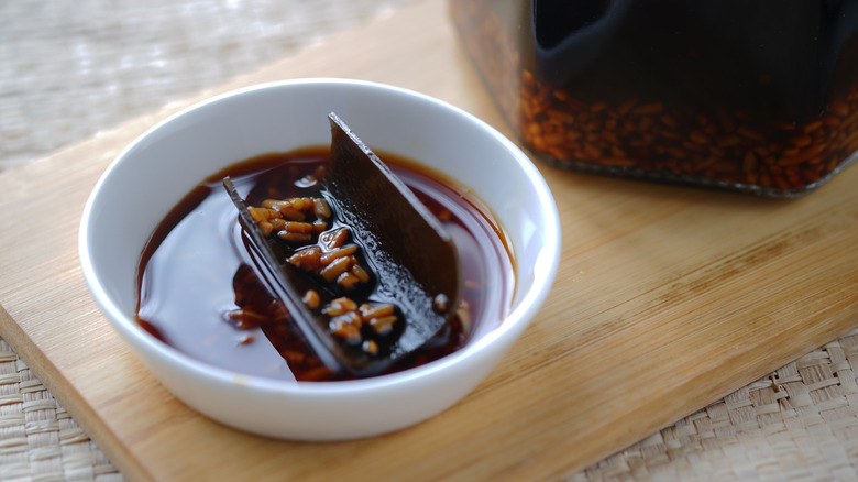 Small bowl of mentsuyu sauce.