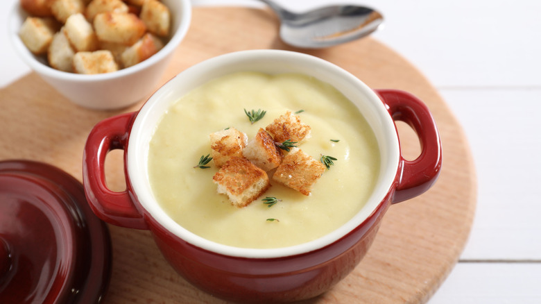 Tasty potato soup with croutons