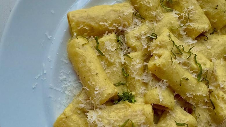 A plate of corn butter pasta.