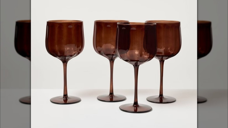 A set of four brown wine glasses from Target's Heart & Home collection.