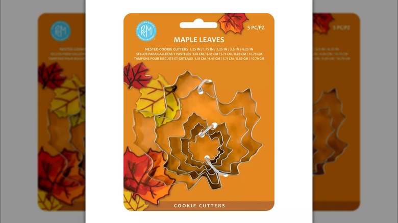 A set of maple leaf-shaped cookie cutters of different sizes still in its packaging from Target.