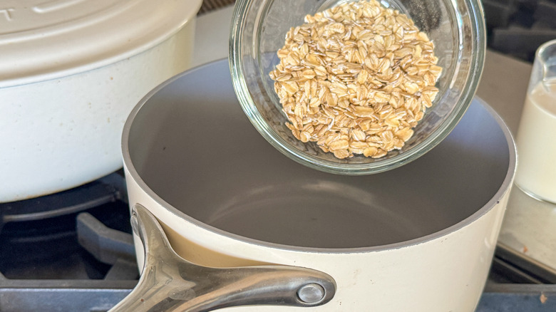 adding oats to pot