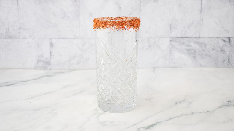 Empty glass with Tajín rim