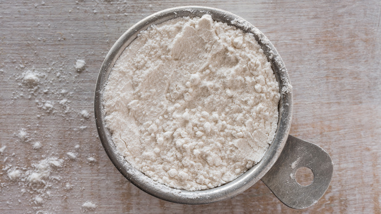All-purpose flour in measuring cup