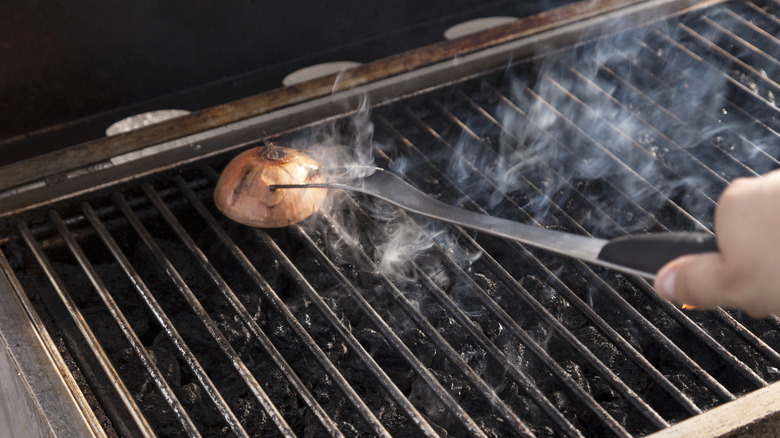 onion heating up on a grill