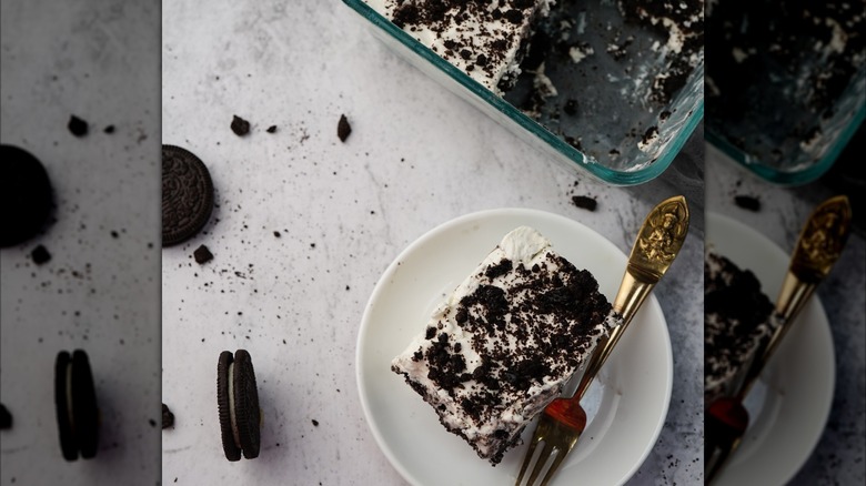 A slice of icebox cake made with Oreo Thins cookies.