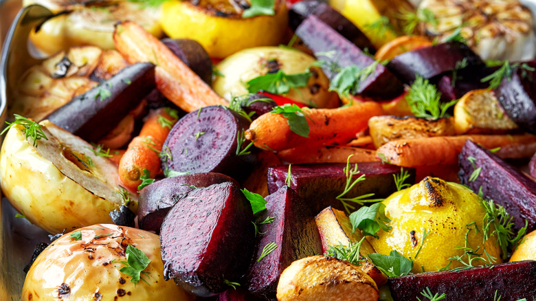 A colorful tray of roasted vegetables.