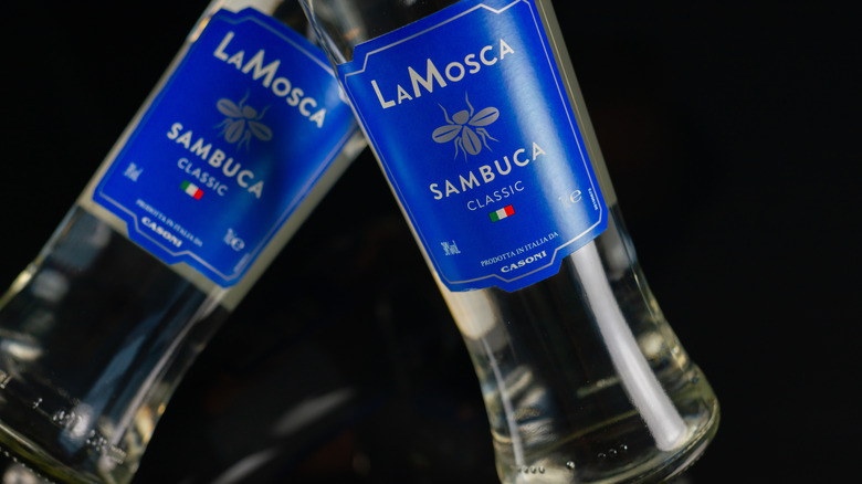 two bottles of white sambuca