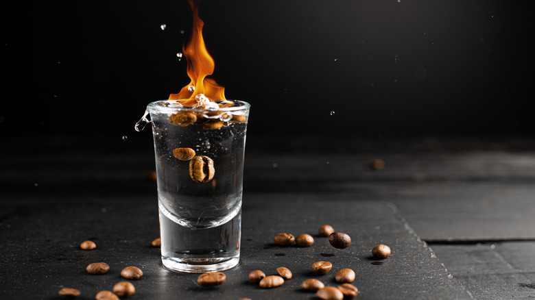 flaming coffee sambuca on a black table