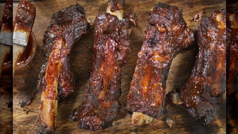 Slow roasted beef ribs covered in barbecue sauce