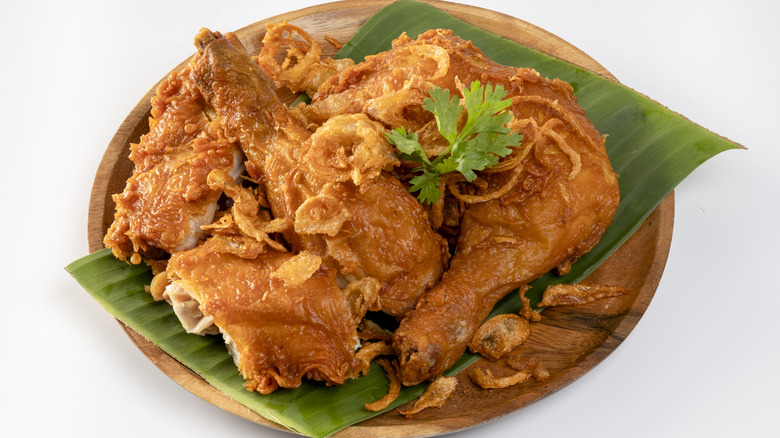 A pile of Thai fried chicken wings (gai tod)