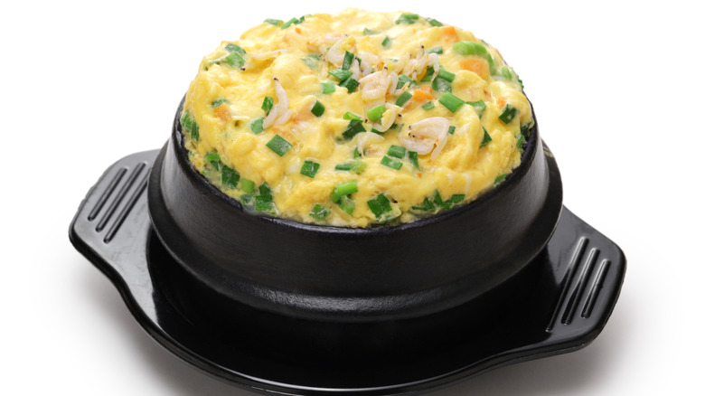 a bowl of gyeran jjim in traditional Korean stone pot