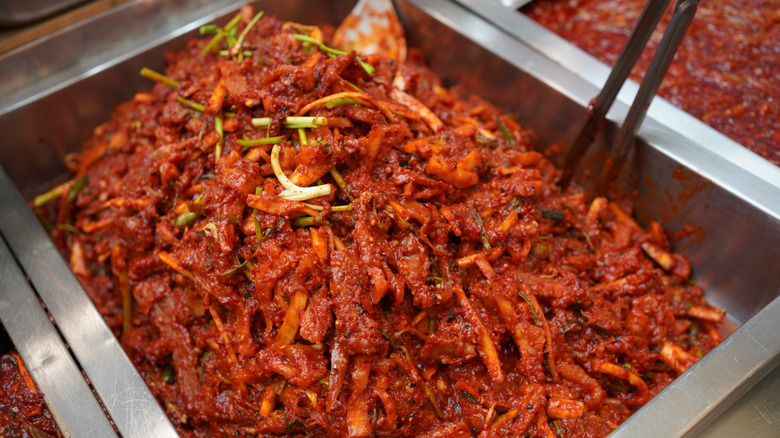 a large container of mu saengchae at traditional Korean market