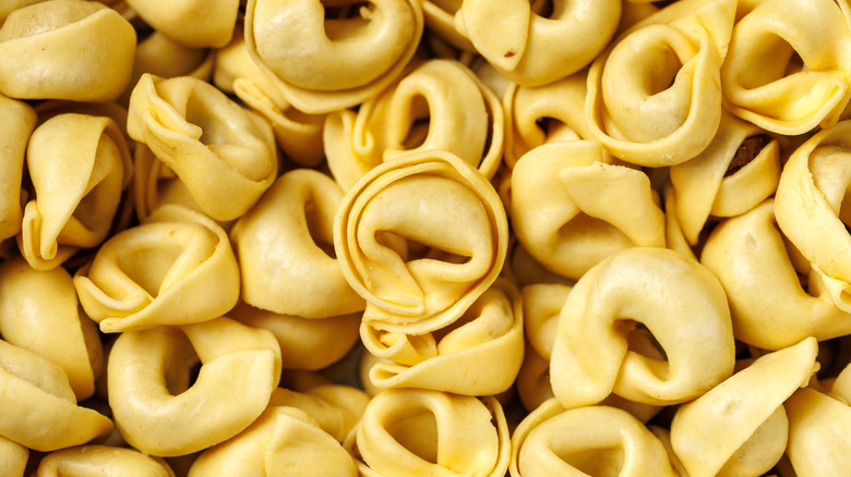 An overhead view of a pile of tortellini