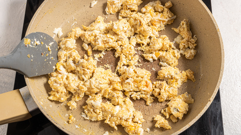 Skillet with scrambled eggs