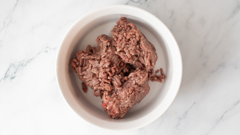 uncooked ground beef in a bowl