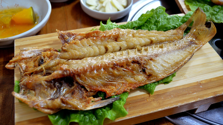 Tilefish served on a cutting board