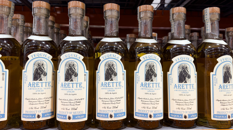 Bottles of Arette Añejo Tequila on a shelf