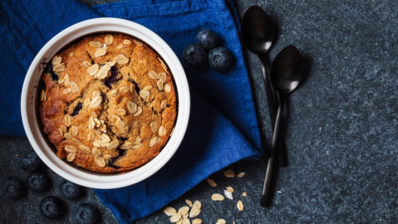Baked oatmeal muffin in ramekin