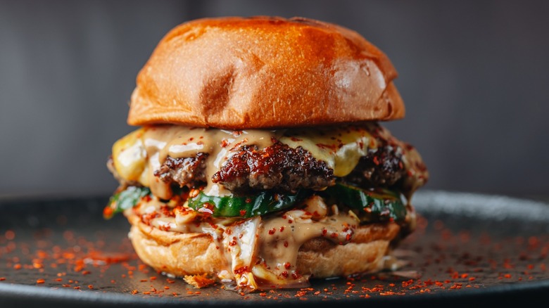 a delicious burger with cheese