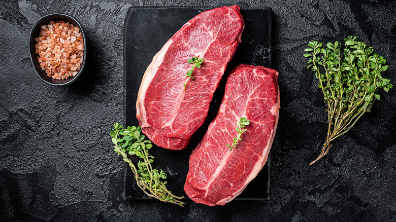 Top blade steak on cutting board
