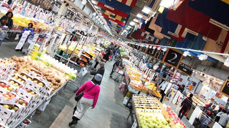 People shopping for produce at DeKalb Farmer's Market