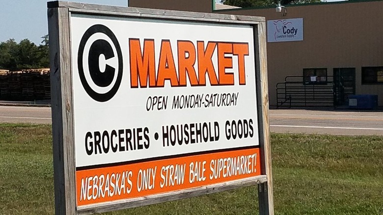 Wooden sign for Circle C Market in Cody, Nebraska