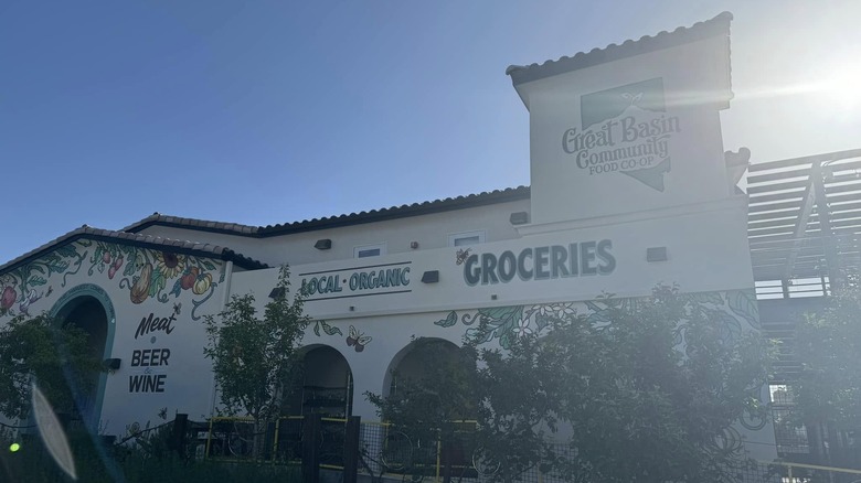 Exterior of stucco grocery store building