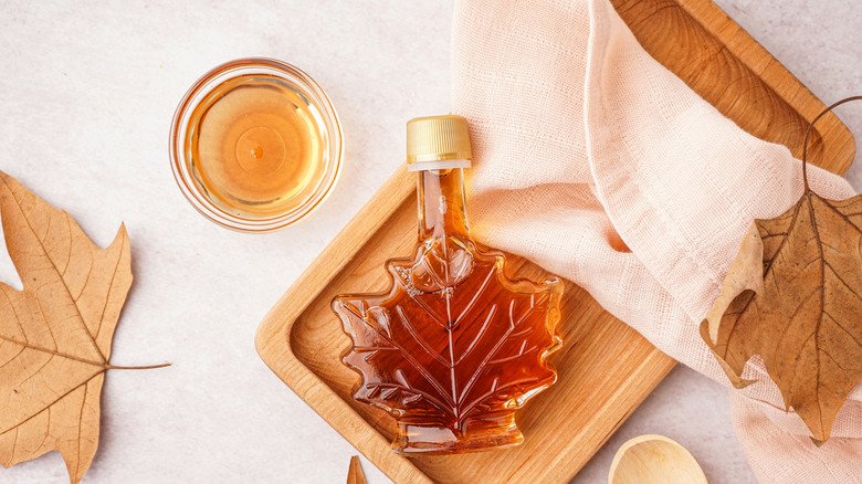 Maple syrup glass container with fall tablescape