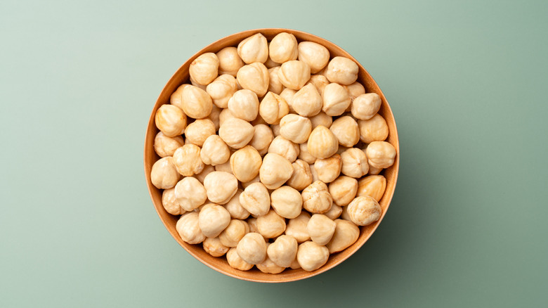Hazelnuts in a brown bowl