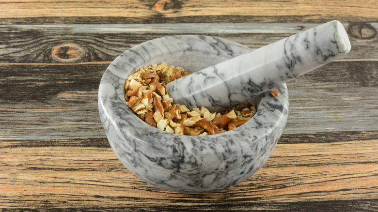 Pretzel in a mortar and pestle