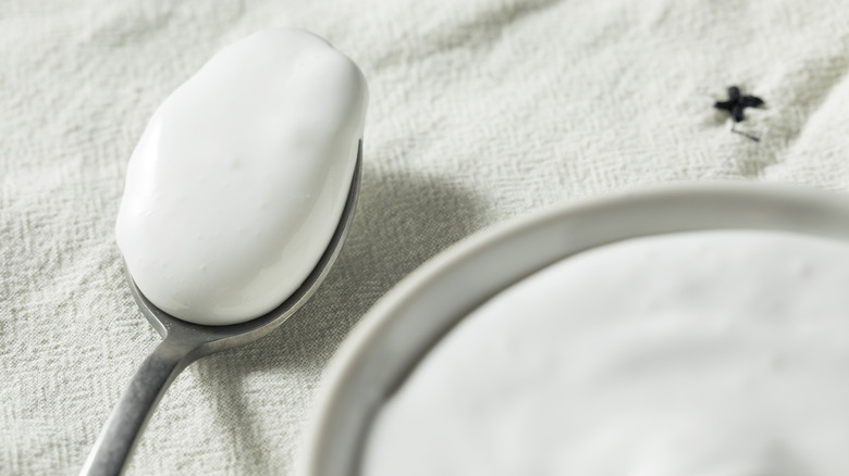 Spoon with a scoop of marshmallow Fluff