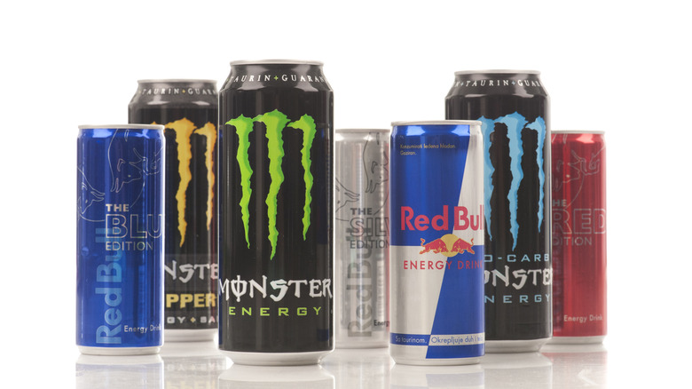 Variety of different Monster and Red Bull energy drinks