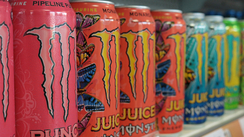 Shelf with a lineup of different Monster flavors