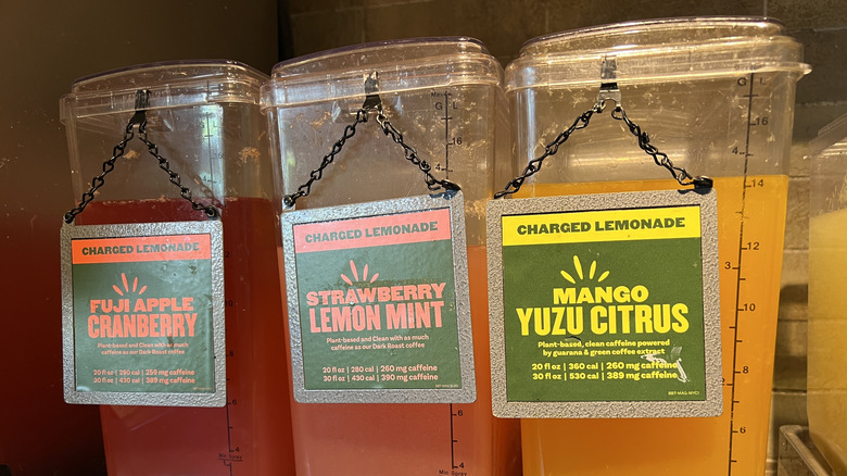 Three Charged Lemonade dispensers