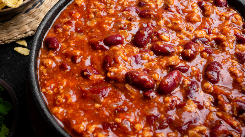 A closeup of hearty chili with beans