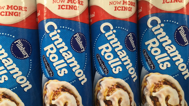 cans of Cinnabon cinnamon rolls