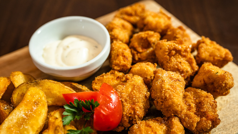 Chicken nuggets and baked potatoes