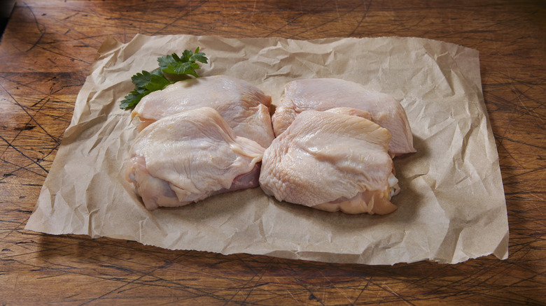Fresh raw chicken thighs